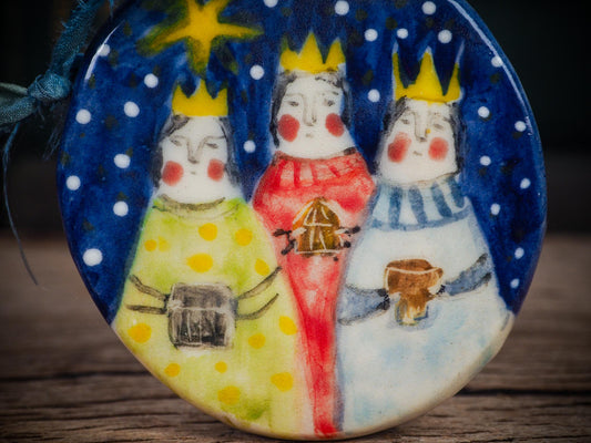 Handmade ceramic Three Wise Kings ornament with guiding star, created by Idania Salcido aka Danita Art for Christmas decorating or gifting.