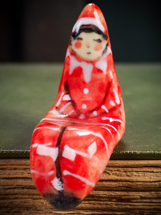 Handmade ceramic red shelf elf companion by Idania Salcido aka Danita Art.