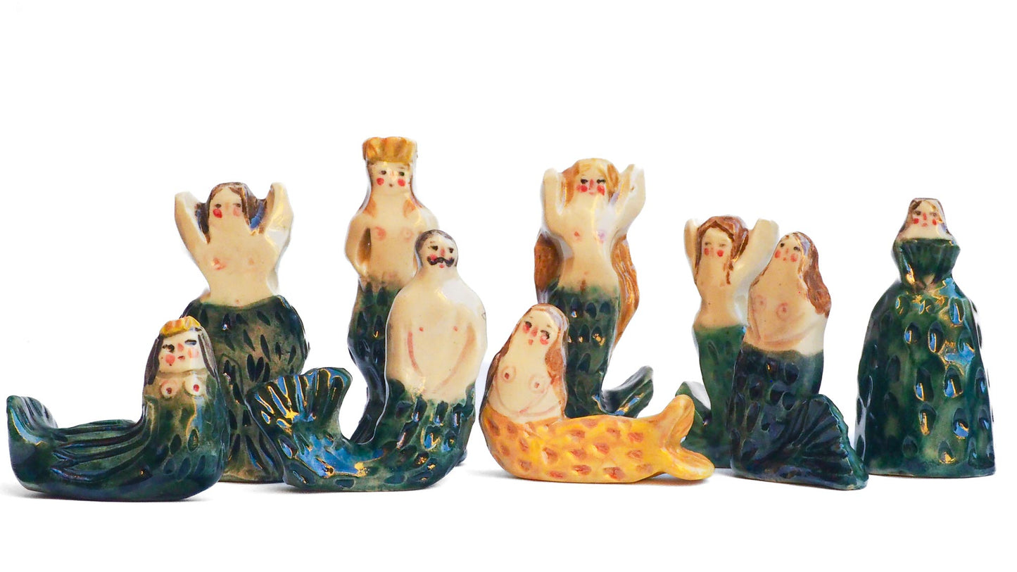 Handmade ceramic mermaid totem amulet figurine hand painted by Idania Salcido, the artist behind Danita art. Ceramic simulates carved wood with colorful glazes.