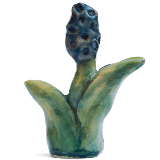 Handmade ceramic flower totem amulet figurine hand painted by Idania Salcido, the artist behind Danita art. Ceramic simulates carved wood with colorful glazes.