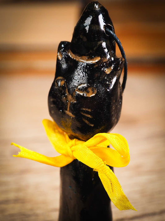 Original handmade ceramic black cat ornament by Idania Salcido Danita Art with silk bow is perfect Halloween decoration! Stands on its own or hangs from window.