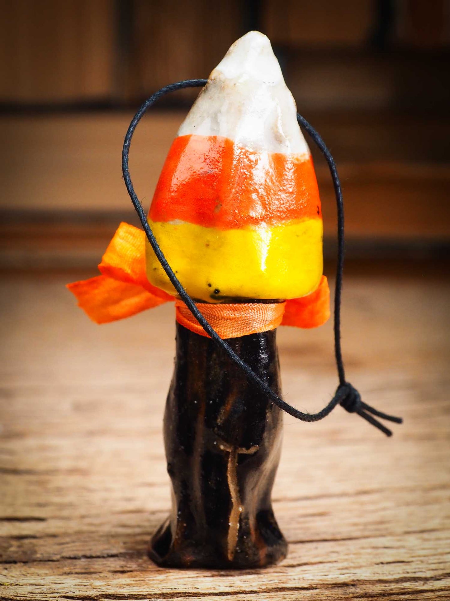 Original handmade ceramic candy corn ornament by Idania Salcido Danita Art with silk bow is perfect Halloween decoration! Stands on its own or hangs from window