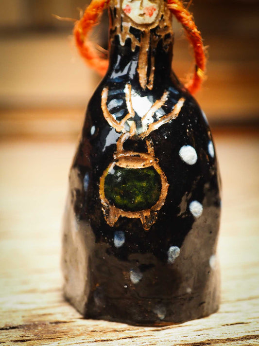 Original handmade ceramic black witch ornament by Idania Salcido Danita Art with thread is perfect Halloween decoration! Stands on its own or hangs from window