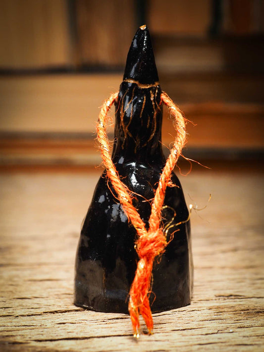 Original handmade ceramic black witch ornament by Idania Salcido Danita Art with thread is perfect Halloween decoration! Stands on its own or hangs from window
