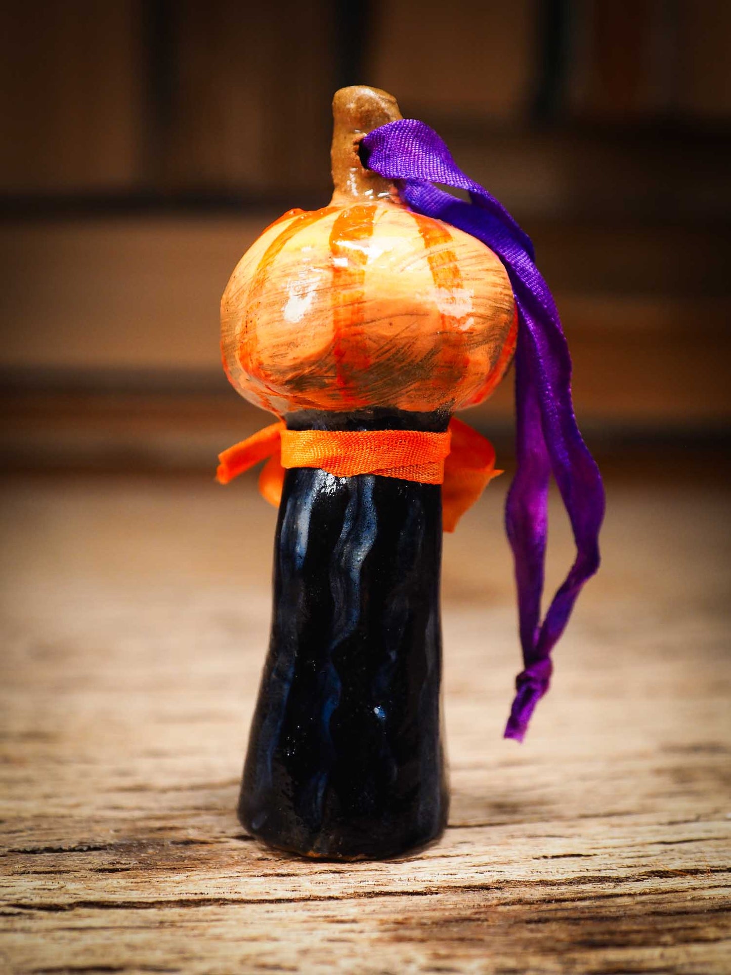 Original handmade ceramic jack-o-lantern pumpkin ornament by Idania Salcido Danita Art is a perfect Halloween decoration! Stands on its own or hangs from window