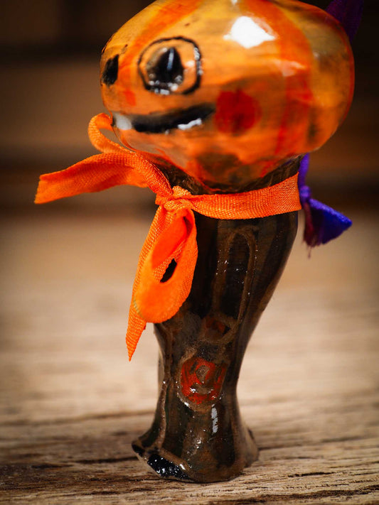 Original handmade ceramic jack-o-lantern pumpkin ornament by Idania Salcido Danita Art is a perfect Halloween decoration! Stands on its own or hangs from window