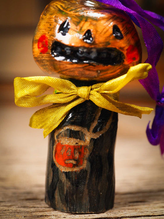 Original handmade ceramic jack-o-lantern pumpkin ornament by Idania Salcido Danita Art is a perfect Halloween decoration! Stands on its own or hangs from window
