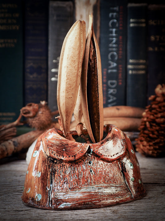 Using hand pinching techniques in of a kind fire glazed ceramics, Idania Salcido, the artist behind Danita Art, sculpted glazed ceramic clay vase containers and flower pots in the shape of vintage blouses. Beautiful accents for your dinner table, showcase or anywhere you want to remind you of family and love.