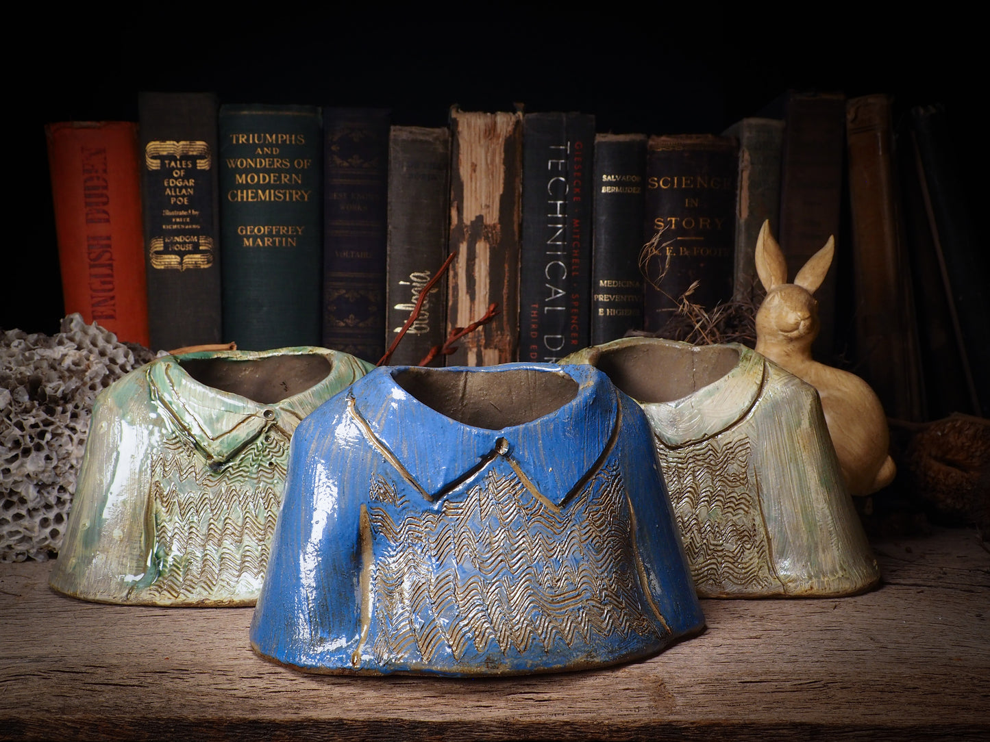 Using hand pinching techniques in of a kind fire glazed ceramics, Idania Salcido, the artist behind Danita Art, sculpted glazed ceramic clay vase containers and flower pots in the shape of vintage blouses. Beautiful accents for your dinner table, showcase or anywhere you want to remind you of family and love.