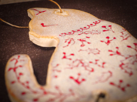 An original Christmas Holiday tree ornament ceramic cat, handmade by Idania Salcido the artist behind Danita Art. Glazed carved sgraffito stoneware, hand painted and decorated, it has a beautiful vintage glass tree ornament to adorn a unique holiday gift for family and friends. Christmas gift for animal and pet lovers.