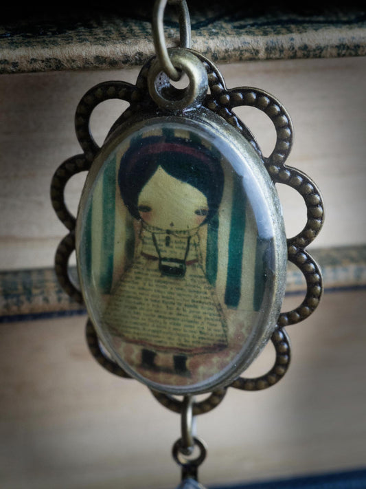 The photographer is a beautiful image set in cute earring jewelry by Danita