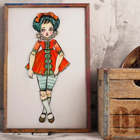A original watercolor painting that is also a dress up paper art doll. Danita painted a girl, cut her and assembled it as a posable and articulated doll.