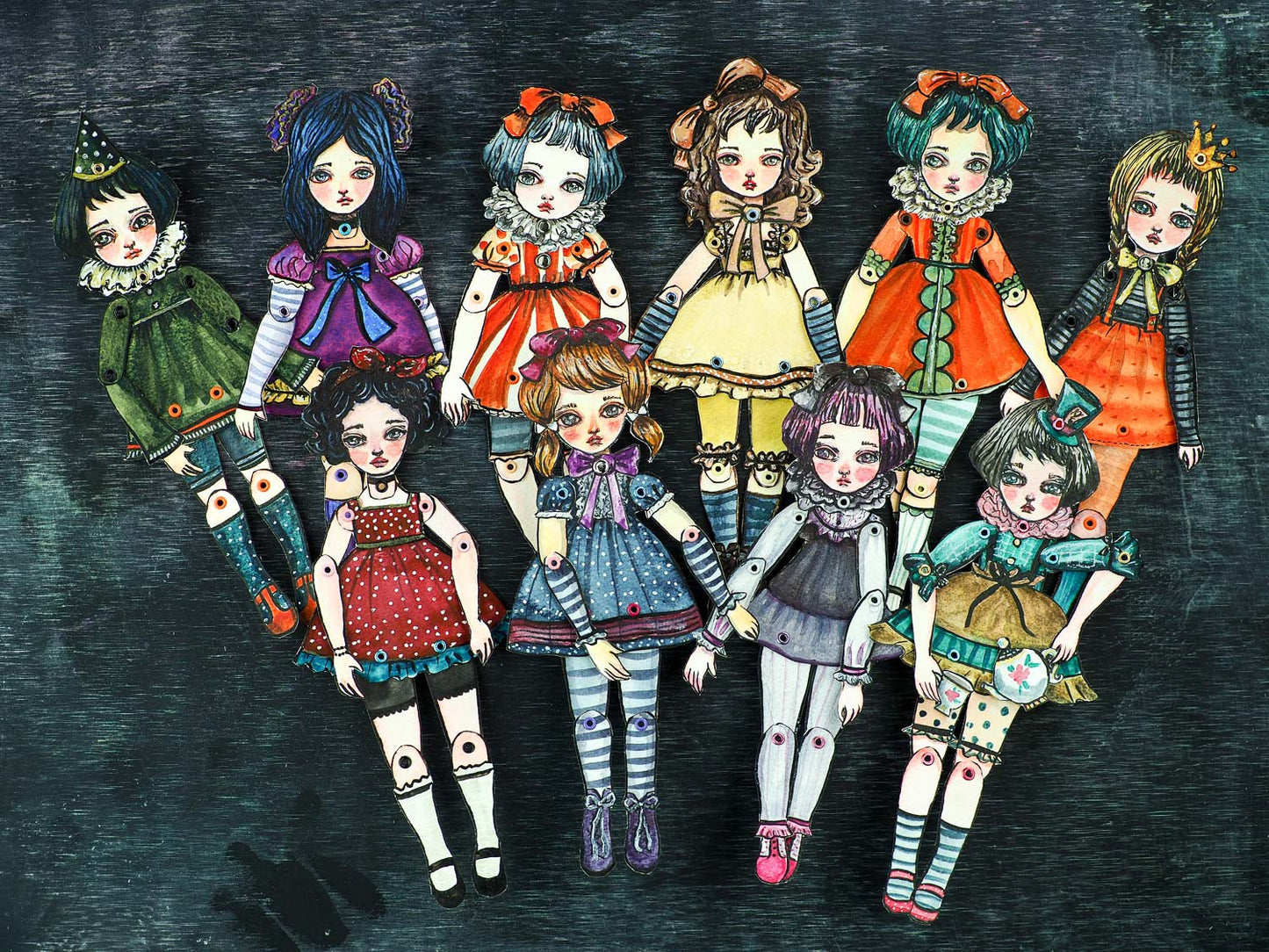 A original watercolor painting that is also a dress up paper art doll. Danita painted a girl, cut her and assembled it as a posable and articulated doll.