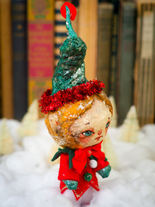Handmade Christmas Elf tree ornament doll by Danita. Whimsical folk art spun cotton home decor figurine for Holiday season, covered in vintage mica.