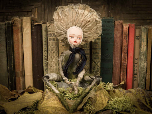 An original handmade art doll by Danita Art, made with original patterns, organic fabric dyed using only natural ingredients like avocado peels, walnuts and marigolds. Each mini art doll in this toy collection is a mini work of huggable fabric art that will be treasured by any collector of Danita's melancholic and fantastic work.