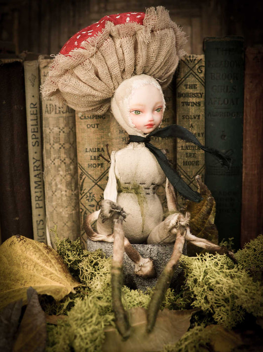 An original forest fairy mushroom fungi toadstool girl art doll handmade by Danita Art, using with original patterns, organic fabric dyed using only natural ingredients like avocado peels, walnuts and marigolds. Each mini art doll in this toy collection is a mini work of huggable fabric art that will be treasured by any collector of Danita's melancholic and fantastic work.