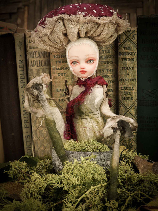 An original handmade art doll by Danita Art, made with original patterns, organic fabric dyed using only natural ingredients like avocado peels, walnuts and marigolds. Each mini art doll in this toy collection is a mini work of huggable fabric art that will be treasured by any collector of Danita's melancholic and fantastic work.