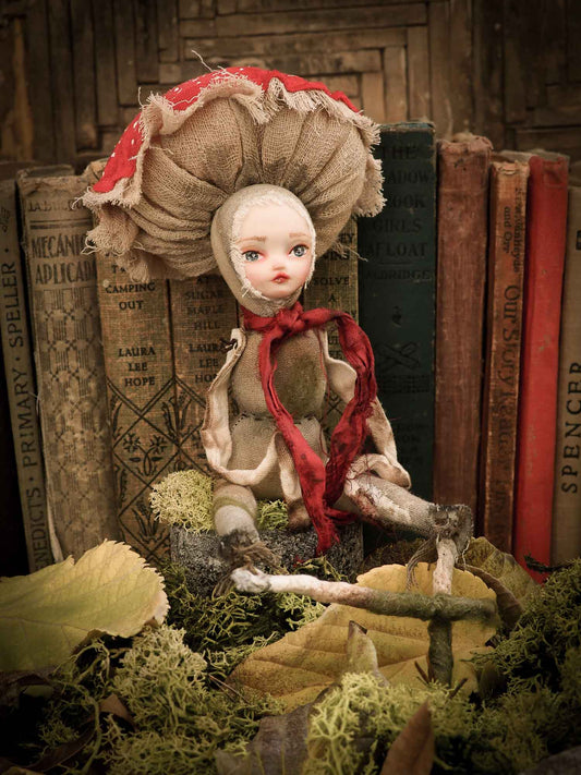 An original handmade art doll by Danita Art, made with original patterns, organic fabric dyed using only natural ingredients like avocado peels, walnuts and marigolds. Each mini art doll in this toy collection is a mini work of huggable fabric art that will be treasured by any collector of Danita's melancholic and fantastic work.