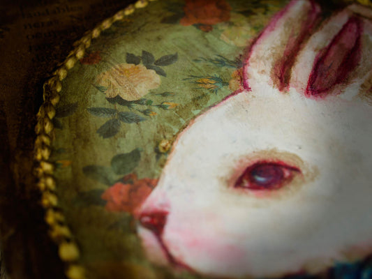 Alice's wild chase of a white rabbit took her on amazing adventures adventures in Wonderland, and here he is on this painting inspired by the beautiful book, created by Danita Art.