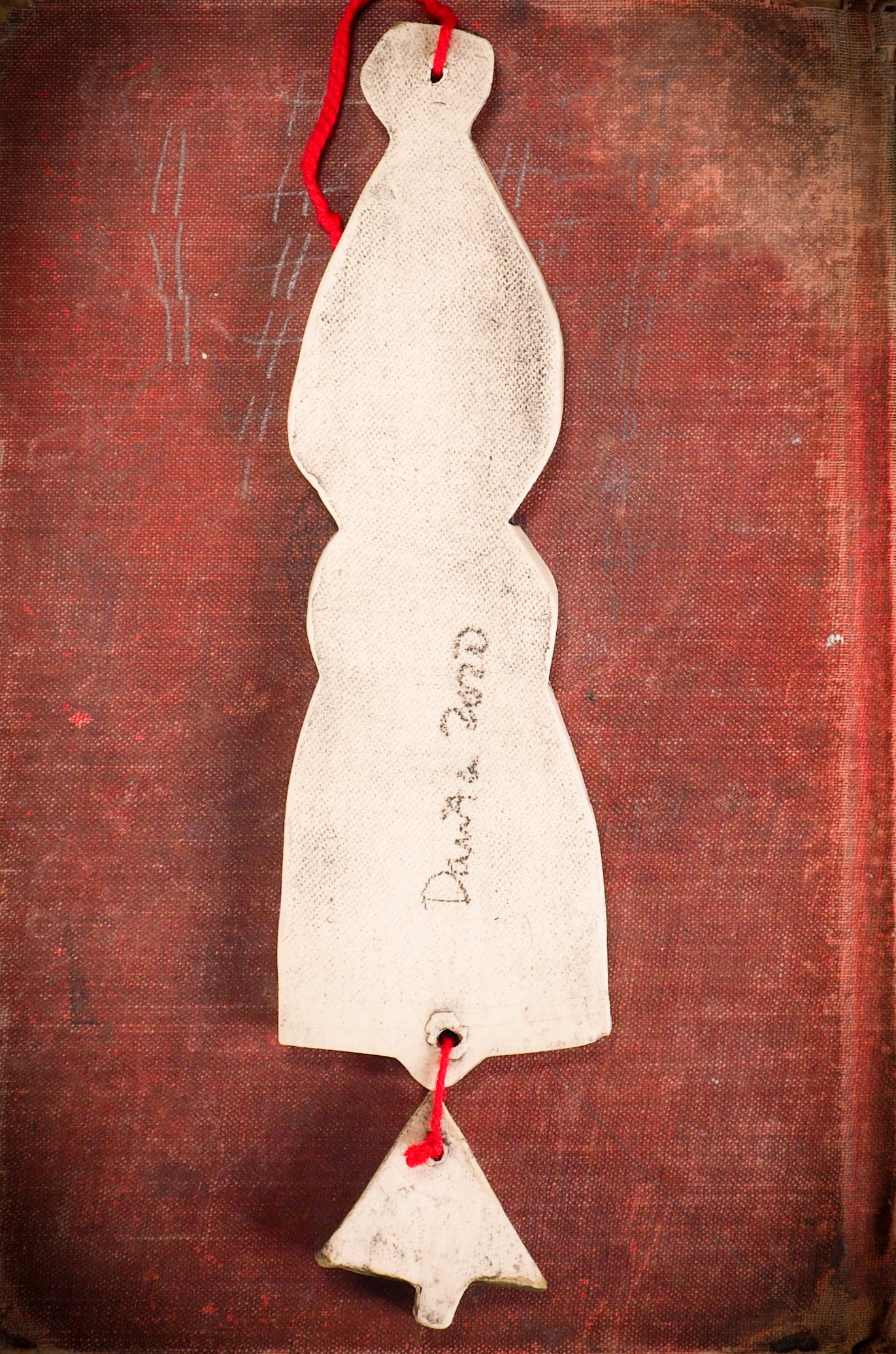 An original Christmas Holiday tree round glazed ceramic ornament handmade by Idania Salcido, the artist behind Danita Art. Glazed carved sgraffito stoneware, hand painted and decorated, it is illustrated by hand with snowmen, Christmas trees, Santa Claus, angels and snow balls and winter themes.