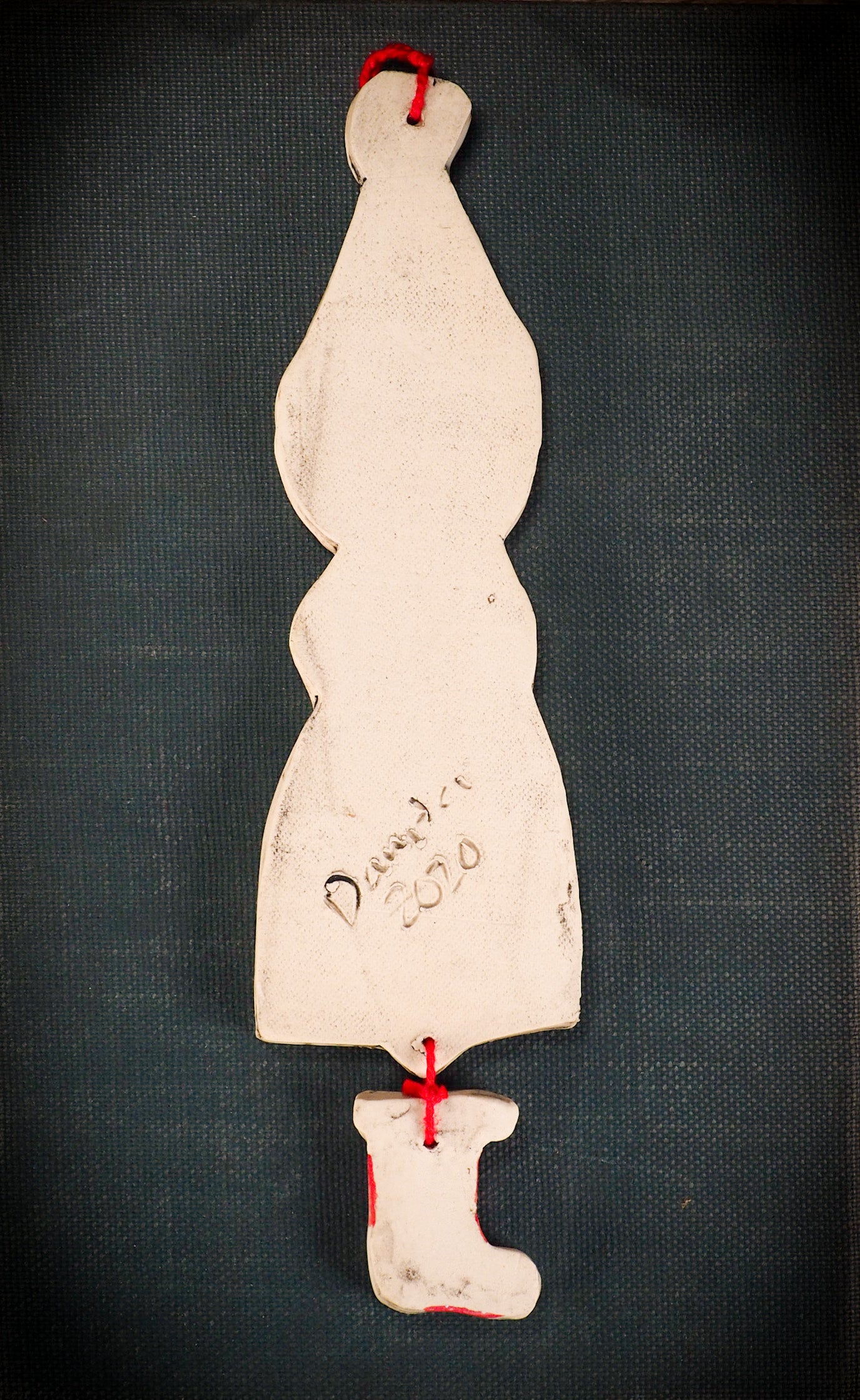 An original Christmas Holiday tree round glazed ceramic ornament handmade by Idania Salcido, the artist behind Danita Art. Glazed carved sgraffito stoneware, hand painted and decorated, it is illustrated by hand with snowmen, Christmas trees, Santa Claus, angels and snow balls and winter themes.