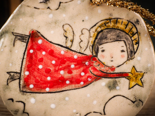 An original Christmas Holiday tree round glazed ceramic ornament handmade by Idania Salcido, the artist behind Danita Art. Glazed carved sgraffito stoneware, hand painted and decorated, it is illustrated by hand with winter scenes with snowmen, Christmas trees, Santa Claus, snow balls and winter themes.