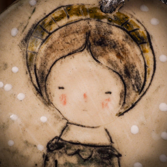 An original Christmas Holiday tree round glazed ceramic ornament handmade by Idania Salcido, the artist behind Danita Art. Glazed carved sgraffito stoneware, hand painted and decorated, it is illustrated by hand with winter scenes with snowmen, Christmas trees, Santa Claus, snow balls and winter themes.