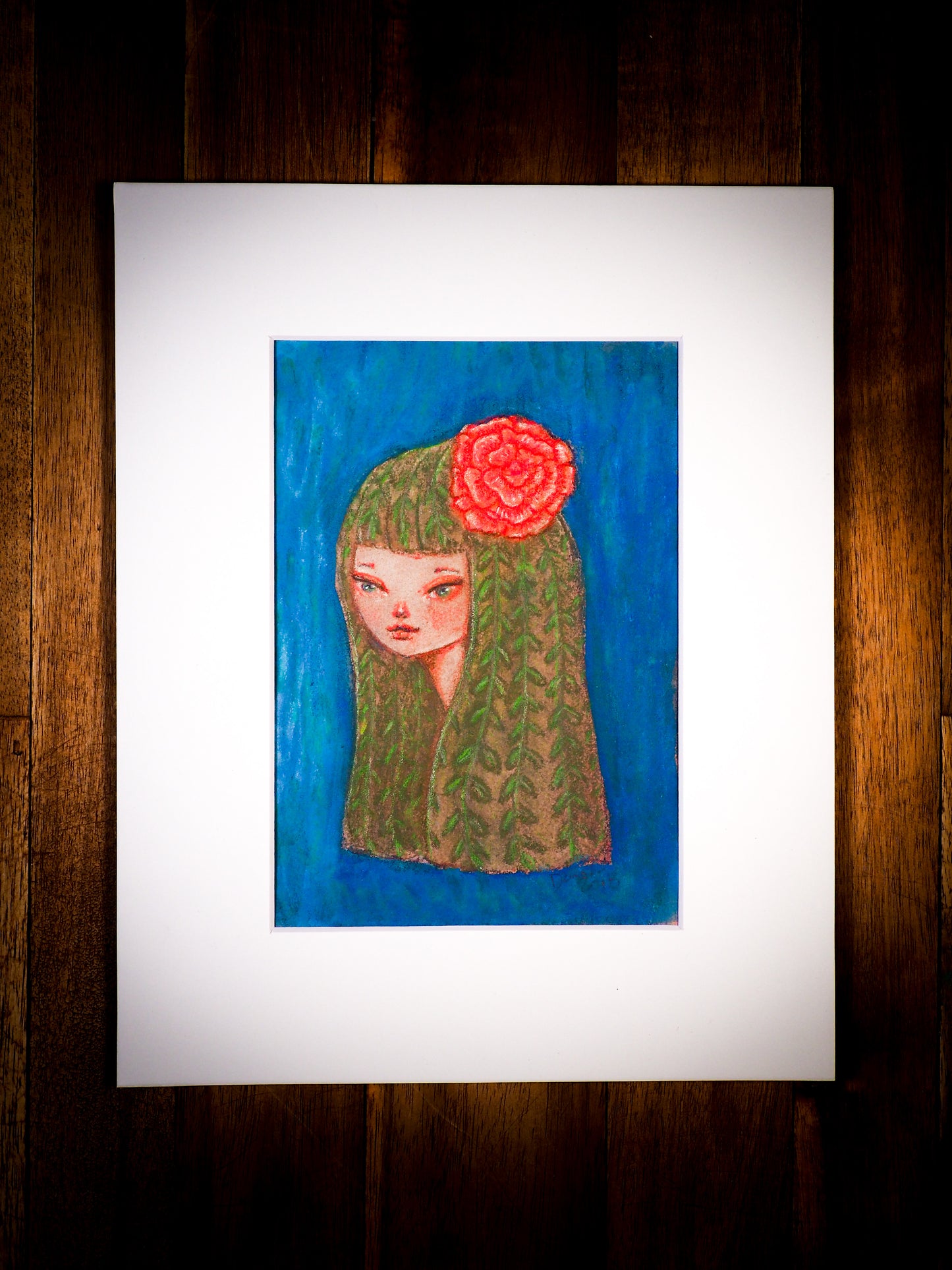 An original mixed media painting by Idania Salcido, the artist behind Danita Art. This is a beautiful mixed media painting, A girl in touch with nature, she even has green hair with braids and a red flower in her hair. Painted with mixed media, pastels, acrylics and watercolors on watercolor paper.