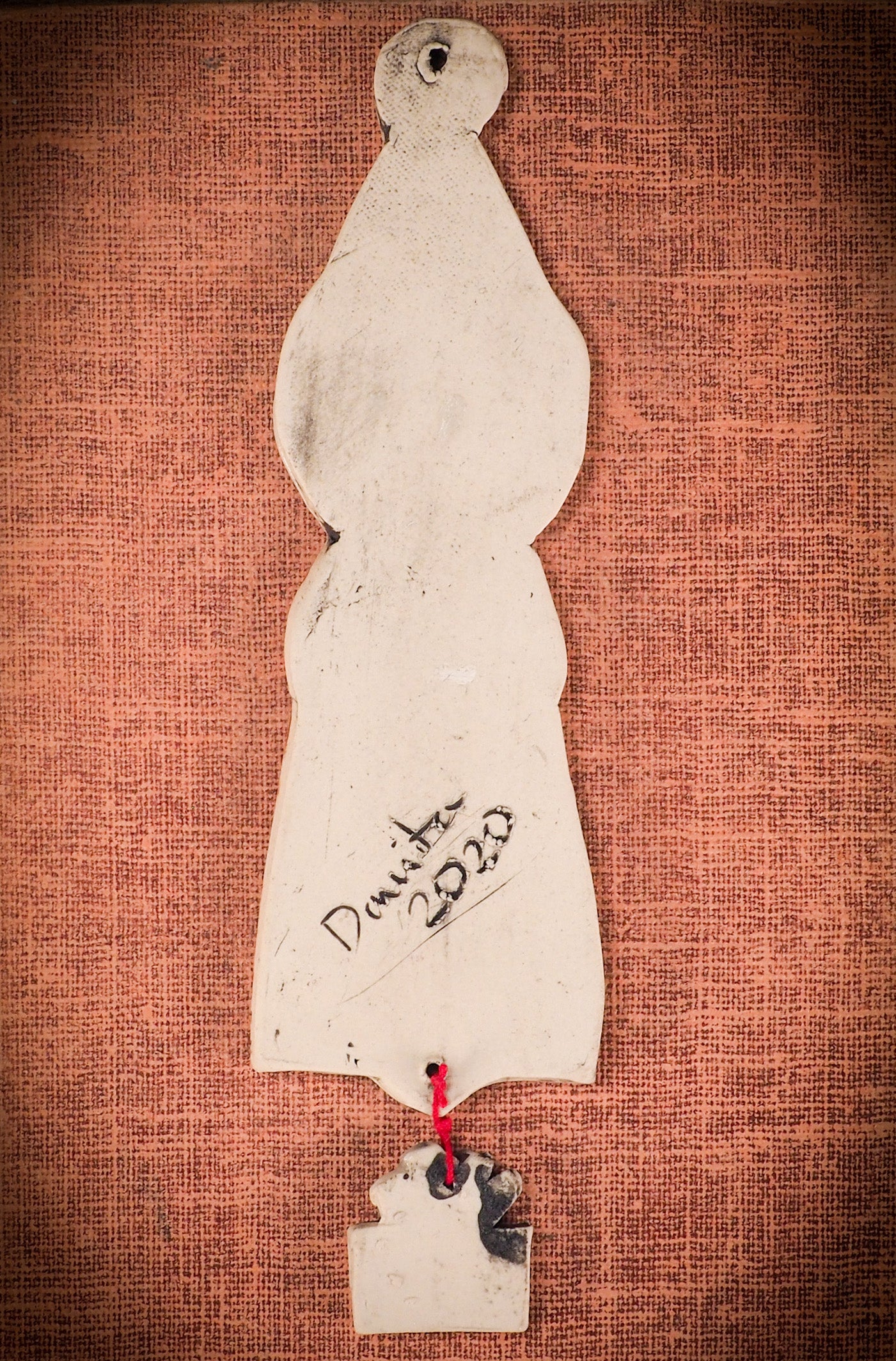 An original Christmas Holiday tree round glazed ceramic ornament handmade by Idania Salcido, the artist behind Danita Art. Glazed carved sgraffito stoneware, hand painted and decorated, it is illustrated by hand with snowmen, Christmas trees, Santa Claus, angels and snow balls and winter themes.