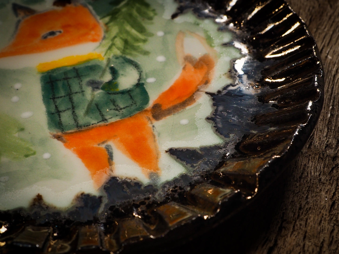 An original Christmas Holiday cake dinner dessert plate round glazed ceramic dinnerware handmade by Idania Salcido, the artist behind Danita Art. Glazed carved sgraffito stoneware, hand painted and decorated, it is illustrated by hand with snowmen, Christmas trees, Santa Claus, angels and snowballs and winter themes.