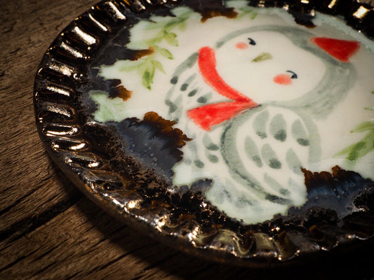 An original Christmas Holiday cake dinner dessert plate round glazed ceramic dinnerware handmade by Idania Salcido, the artist behind Danita Art. Glazed carved sgraffito stoneware, hand painted and decorated, it is illustrated by hand with snowmen, Christmas trees, Santa Claus, angels and snowballs and winter themes.
