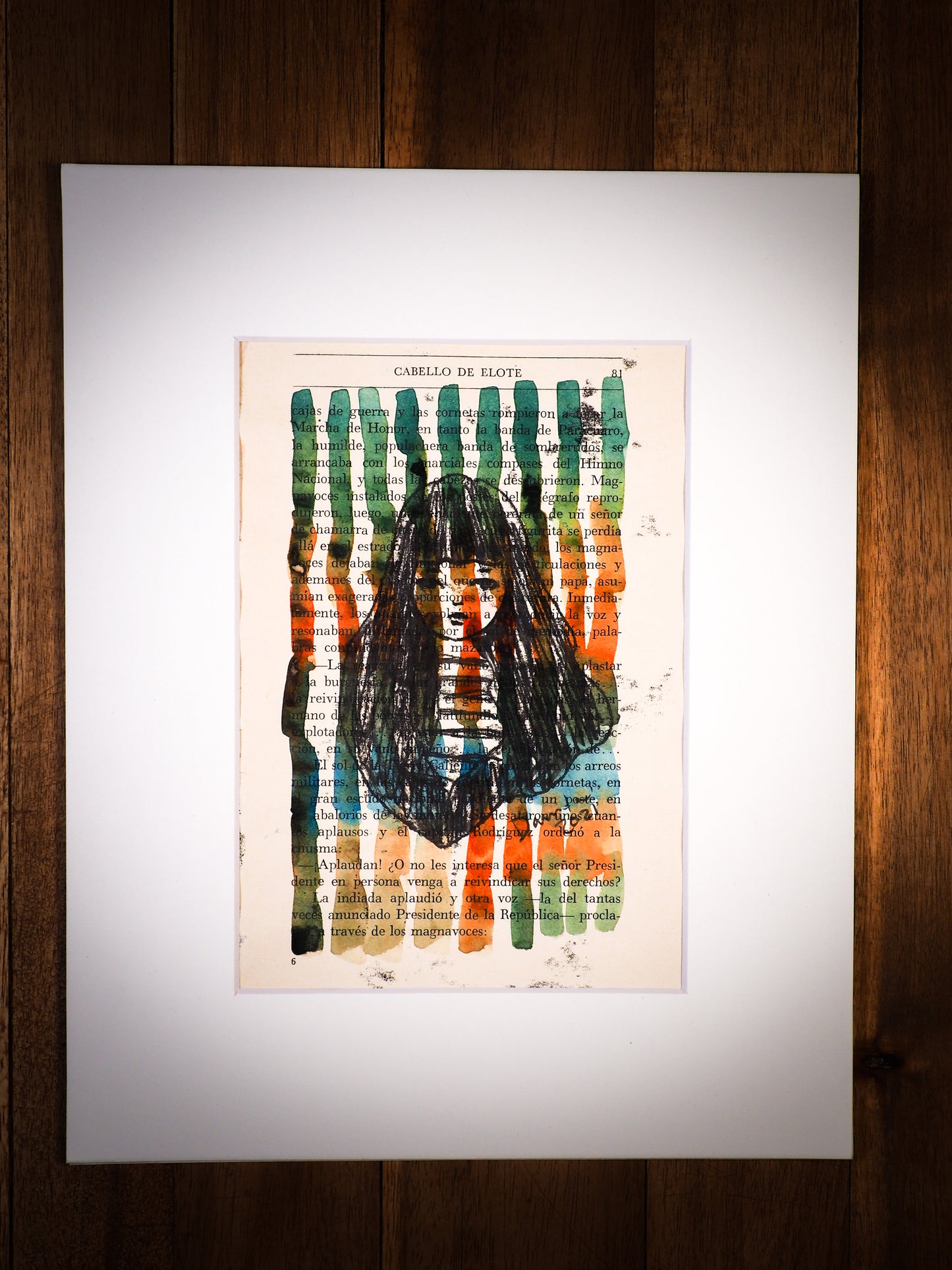 An original mixed media painting by Idania Salcido, the artist behind Danita Art. This is a beautiful mixed media painting, a beautiful self portrait painted in warm watercolor paints, inks and pen over a page of a vintage book from early 20th century.