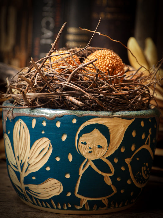 You are looking at original handmade fire glazed stoneware ceramic piece with sgraffito bird and peasant girl motifs in a deep aquamarine color by Idania Salcido, the artist behind Danita Art. Each original Danita Art ceramics piece is unique and special and cannot be repeated. You are getting a one of a kind work of art to display, or use it as one of your favorite home decorations.