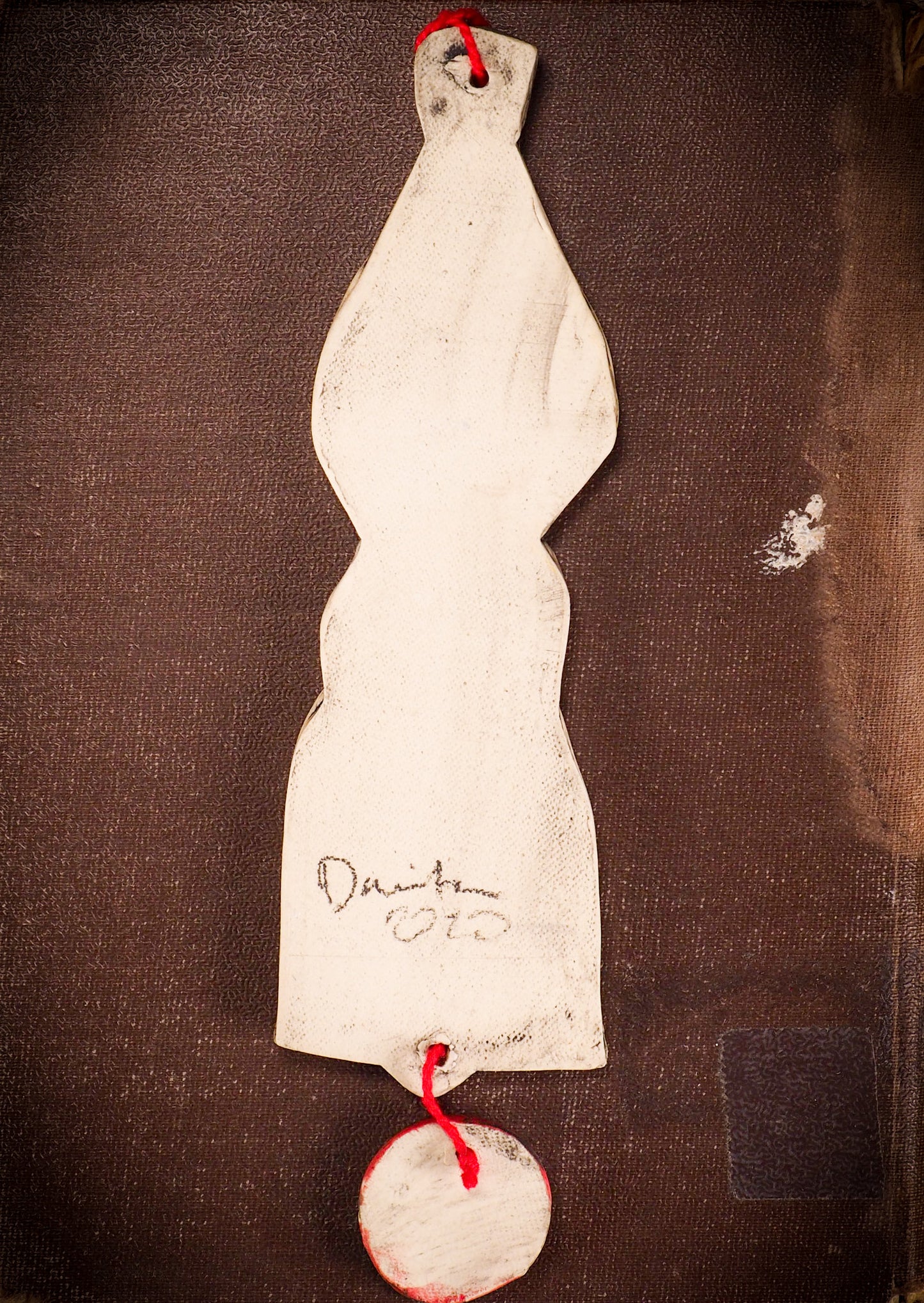 An original Christmas Holiday tree round glazed ceramic ornament handmade by Idania Salcido, the artist behind Danita Art. Glazed carved sgraffito stoneware, hand painted and decorated, it is illustrated by hand with snowmen, Christmas trees, Santa Claus, angels and snow balls and winter themes.