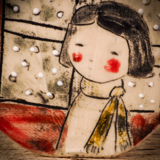 An original Christmas Holiday tree round glazed ceramic ornament handmade by Idania Salcido, the artist behind Danita Art. Glazed carved sgraffito stoneware, hand painted and decorated, it is illustrated by hand with winter scenes with snowmen, Christmas trees, Santa Claus, snow balls and winter themes.