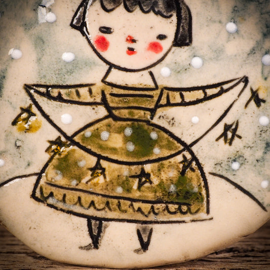 An original Christmas Holiday tree round glazed ceramic ornament handmade by Idania Salcido, the artist behind Danita Art. Glazed carved sgraffito stoneware, hand painted and decorated, it is illustrated by hand with winter scenes with snowmen, Christmas trees, Santa Claus, snow balls and winter themes.