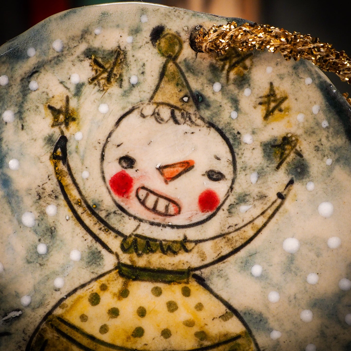 An original Christmas Holiday tree round glazed ceramic ornament handmade by Idania Salcido, the artist behind Danita Art. Glazed carved sgraffito stoneware, hand painted and decorated, it is illustrated by hand with winter scenes with snowmen, Christmas trees, Santa Claus, snow balls and winter themes.