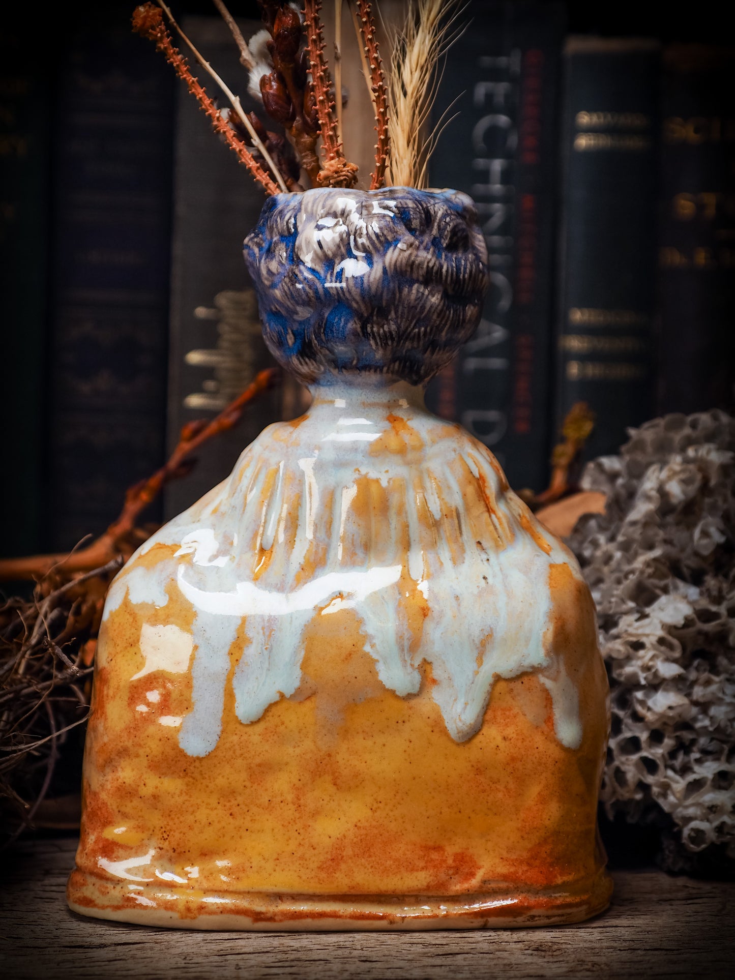 Original handmade ceramic flower vase, artist brush and pencil holder by Idania Salcido, Danita Art. A honeycomb bee shaped statue with china doll head. Handmade touch to any artist's studio with handmade glazed ceramic good for watercolors acrylics inks and oil paints. Clean with water or mineral spirits.