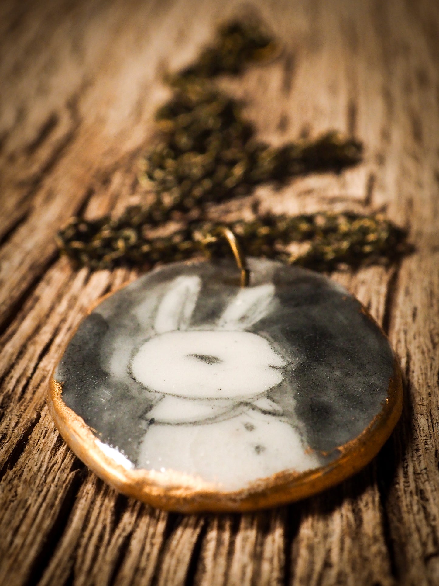 Unique fired ceramic porcelain necklace oval pendant by Idania Salcido, the artist behind Danita Art. Each jewelry setting is hand drawn and illustrated by the artist in her art studio, perfect for any dressing style. A casual gathering with friends or a fancy formal dinner, this necklace is a perfect fashion accessory.