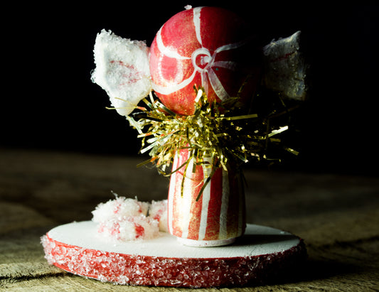 Peppermint candy girl, a holiday wood kokeshi art doll created by Danita Art