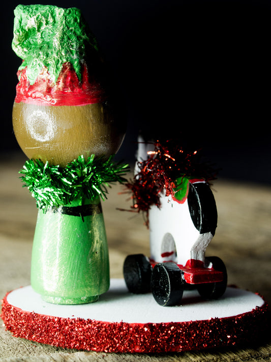 Santa's little helper, a holiday wood kokeshi art doll created by Danita Art