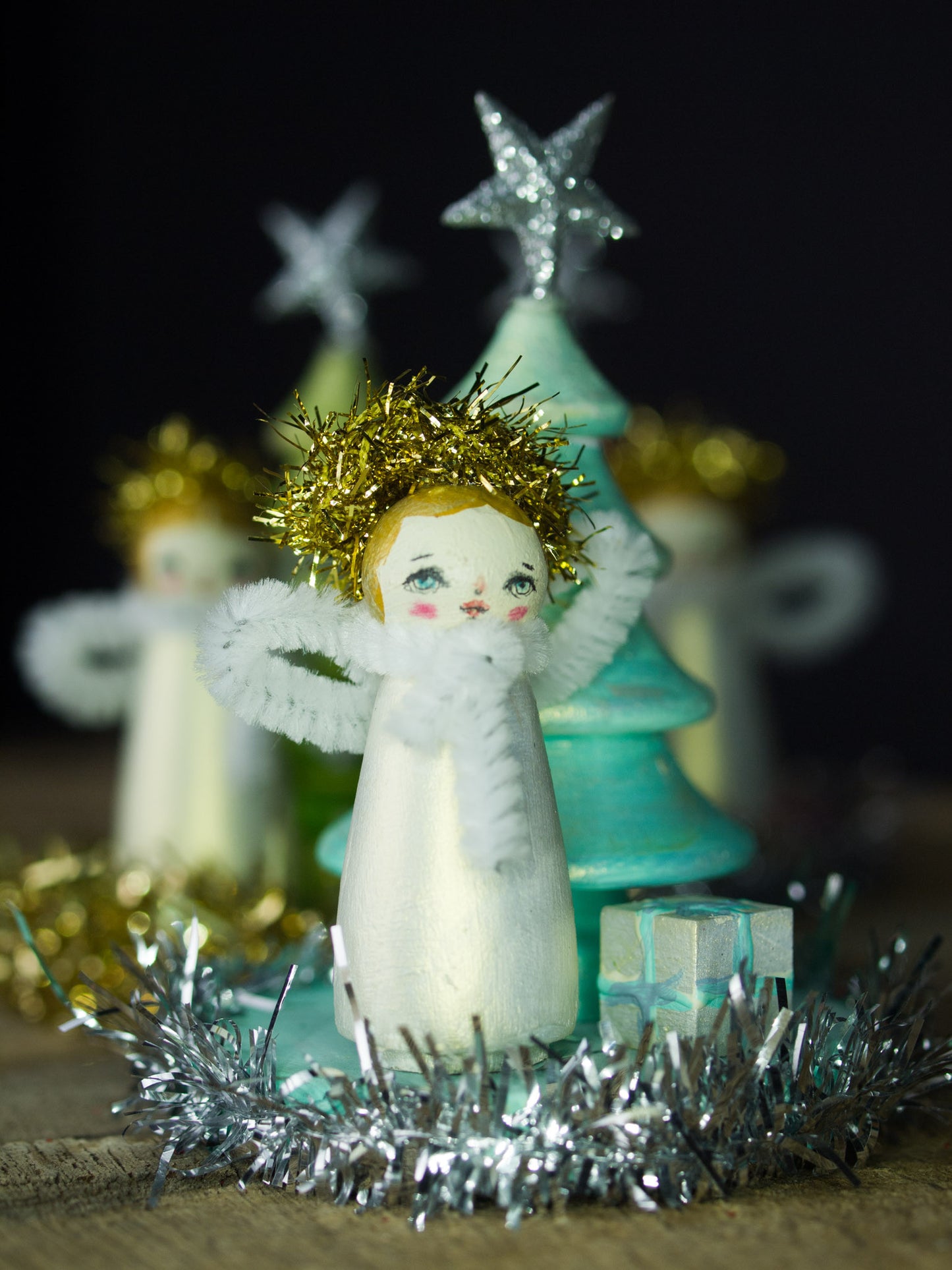 The angel of creativity, a holiday wood kokeshi art doll created by Danita Art