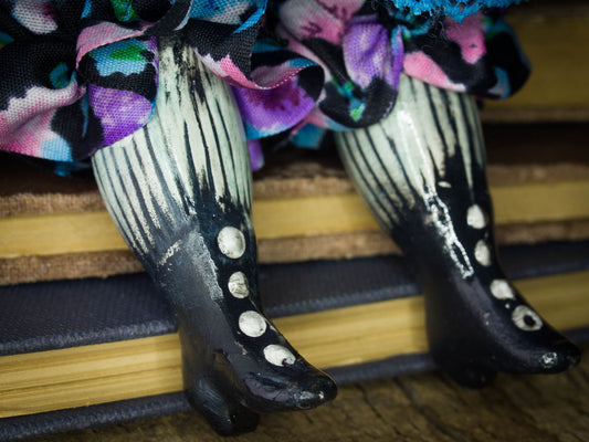 Pauline, a beautiful handmade art doll created by Danita Art with mixed media techniques, fabric and paper clay to create a sweet face with amazingly expressive blue eyes.