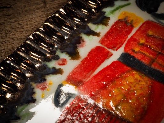 An original Christmas Holiday cake dinner dessert plate round glazed ceramic dinnerware handmade by Idania Salcido, the artist behind Danita Art. Glazed carved sgraffito stoneware, hand painted and decorated, it is illustrated by hand with snowmen, Christmas trees, Santa Claus, angels and snowballs and winter themes.