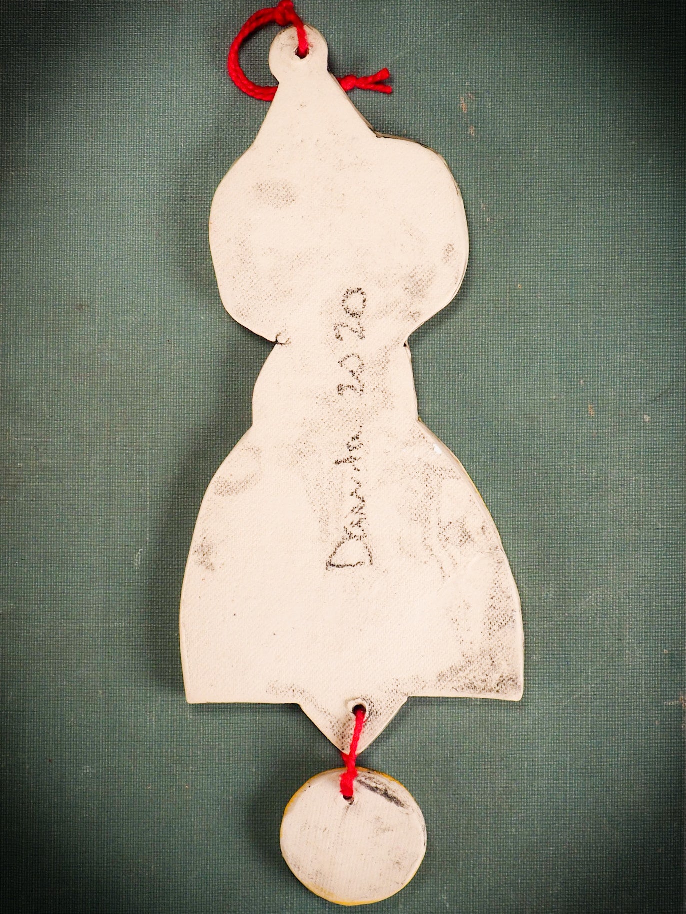 An original Christmas Holiday tree round glazed ceramic ornament handmade by Idania Salcido, the artist behind Danita Art. Glazed carved sgraffito stoneware, hand painted and decorated, it is illustrated by hand with snowmen, Christmas trees, Santa Claus, angels and snow balls and winter themes.