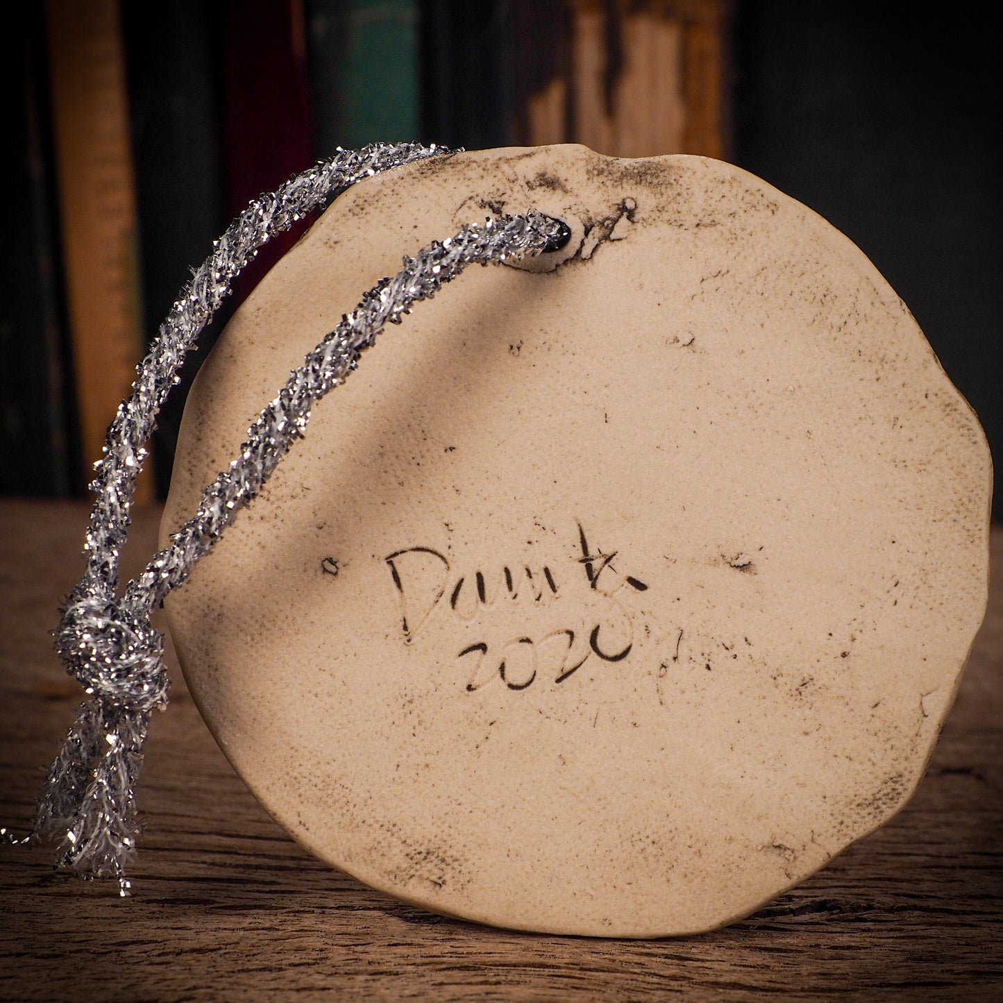 An original Christmas Holiday tree round glazed ceramic ornament handmade by Idania Salcido, the artist behind Danita Art. Glazed carved sgraffito stoneware, hand painted and decorated, it is illustrated by hand with winter scenes with snowmen, Christmas trees, Santa Claus, snow balls and winter themes.