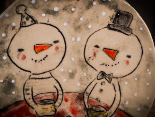 An original Christmas Holiday tree round glazed ceramic ornament handmade by Idania Salcido, the artist behind Danita Art. Glazed carved sgraffito stoneware, hand painted and decorated, it is illustrated by hand with winter scenes with snowmen, Christmas trees, Santa Claus, snow balls and winter themes.