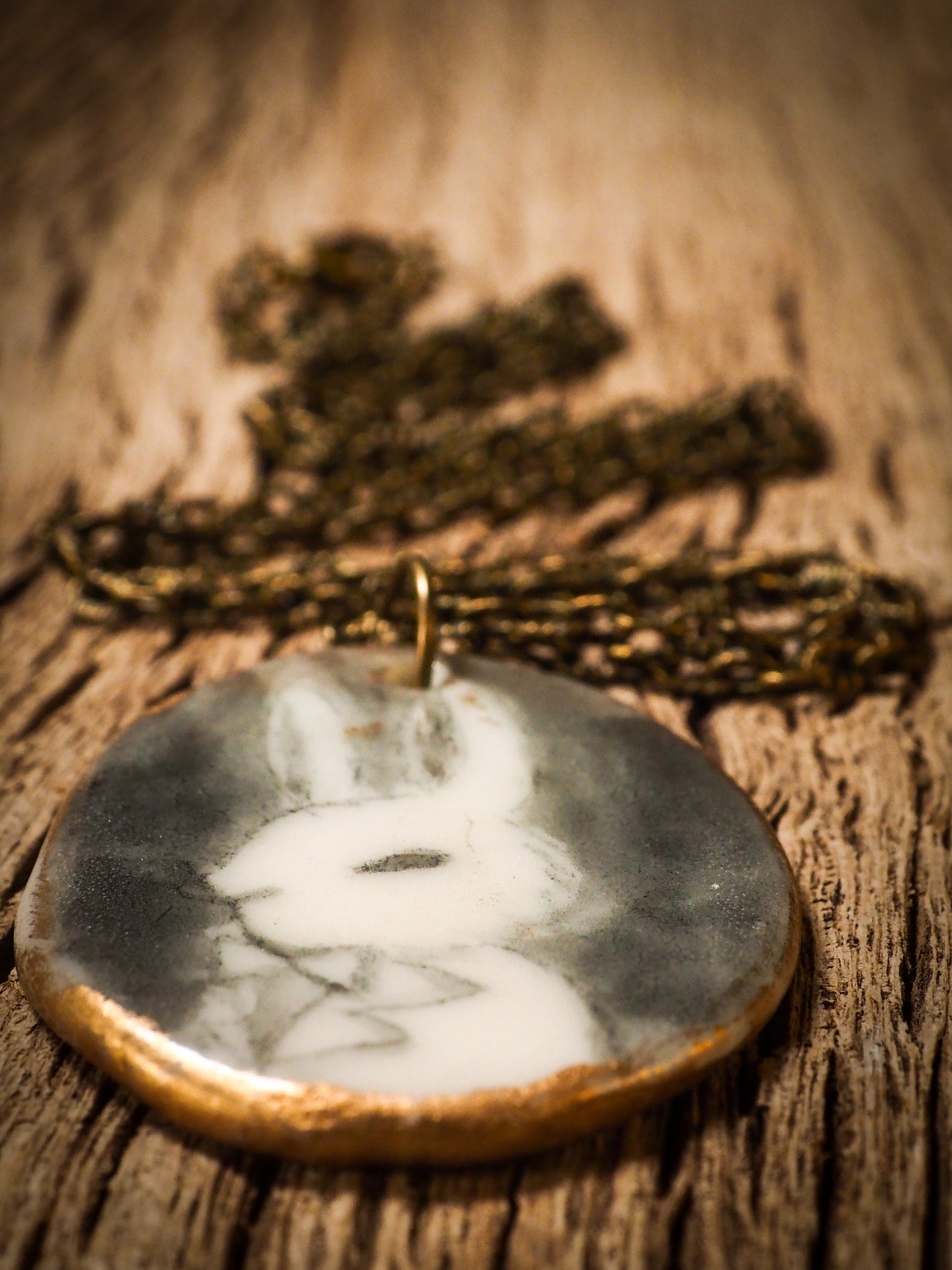 Unique fired ceramic porcelain necklace oval pendant by Idania Salcido, the artist behind Danita Art. Each jewelry setting is hand drawn and illustrated by the artist in her art studio, perfect for any dressing style. A casual gathering with friends or a fancy formal dinner, this necklace is a perfect fashion accessory.