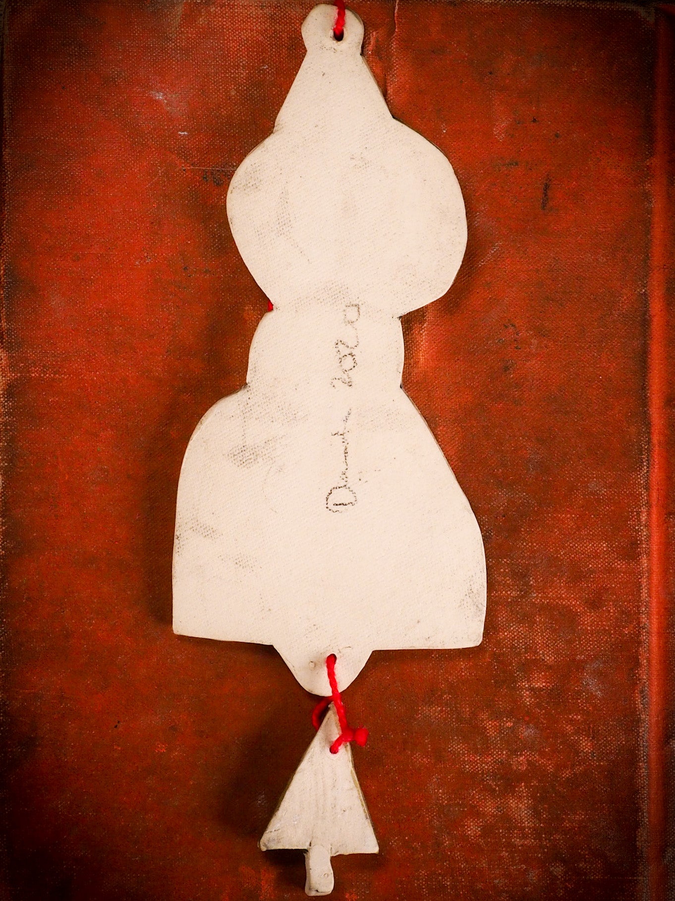 An original Christmas Holiday tree round glazed ceramic ornament handmade by Idania Salcido, the artist behind Danita Art. Glazed carved sgraffito stoneware, hand painted and decorated, it is illustrated by hand with snowmen, Christmas trees, Santa Claus, angels and snow balls and winter themes.