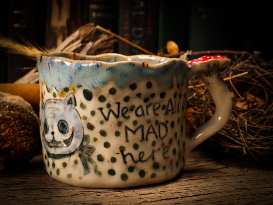 WE’RE ALL MAD HERE - CERAMIC MUG